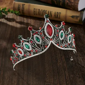 Baroque style red and green rhinestone bridal crown close-up, luxury alloy tiara detail for party.