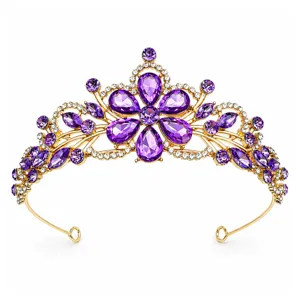 Bridal gold tiara detail shot featuring sparkling purple crystal stones and clear pavé rhinestones.