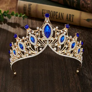 Luxury baroque gold tiara bridal crown with blue and clear rhinestones for wedding party.