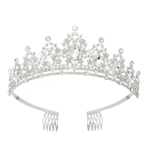 Close-up of crystal tiara details, clear rhinestones, alloy base with side hair combs.