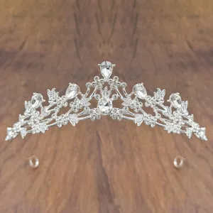 Crystal rhinestone tiara detail, silver plated hair band, elegant children hair accessory.