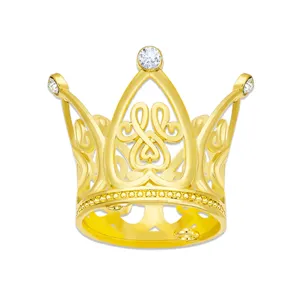 Gold alloy mini crown cake topper with sparkling rhinestones, perfect for birthday parties and hair decor.