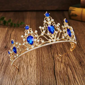 Luxury gold bridal tiara crown with deep blue teardrop crystal rhinestones for wedding party.