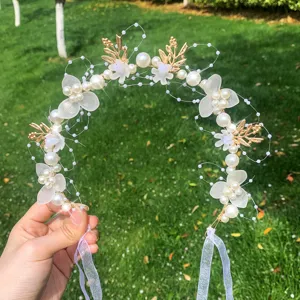 Kids fairy floral headband with pearls and gold leaves, perfect for parties and shows.