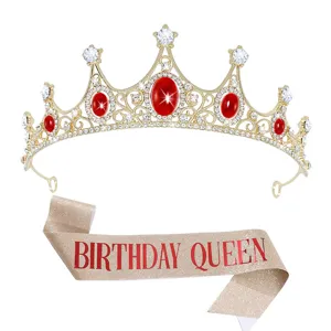 Detailed view of the luxury gold rhinestone tiara and sparkling birthday queen sash set.