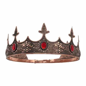 Vintage copper crown detail with red gems, perfect for medieval costume and party decor.