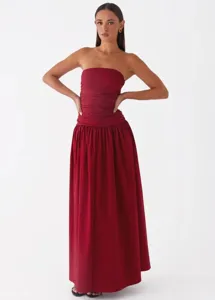 Strapless ruched bodice design, elegant burgundy long dress, premium fashion style.