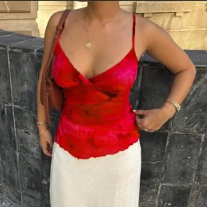 Red tie-dye floral print camisole tank top, sexy V-neck summer slim fit apparel style.