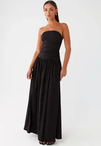 Stunning black strapless pleated maxi dress featuring a chic cinched waist and elegant design.