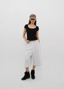 Full view of American vintage drawstring wide-leg cropped pants on model