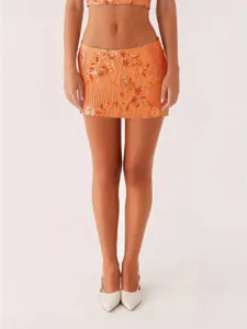 Auffälliger orange Pailletten Minirock für Damen, sexy niedriger Bund Hüftrock Partykleidung