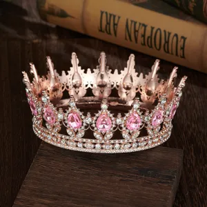 Baroque rose gold crown with pink teardrop crystals and rhinestones for bridal wedding.