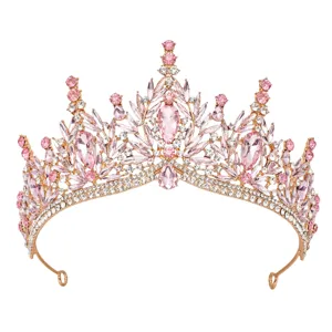 Exquisite rose gold crystal tiara with sparkling pink rhinestones for bridal detail view.