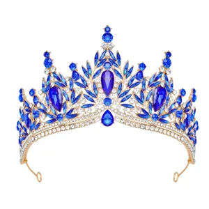Exquisite blue crystal tiara detail shot showcasing sparkling rhinestones and metalwork.