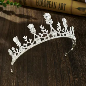 Silver rhinestone bridal tiara detail, elegant wedding crown with sparkling crystal stones.