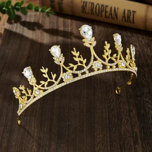 Gold bridal tiara detail, crystal rhinestone crown close-up, elegant wedding hair accessory.