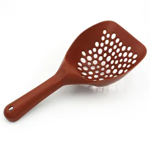 Detailed view of brown plastic cat litter scoop with mesh holes and long handle for daily pet care.