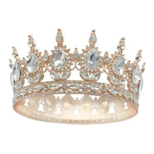 Exquise couronne de mariée ronde baroque avec des strass en larme scintillants et or rose.