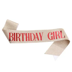 Glitter gold birthday girl sash party accessory detail shot, elegant celebration ribbon decor