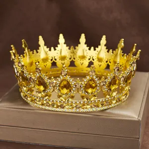 Baroque alloy rhinestone crown detail, luxurious gold tiara with amber crystals for party hair.
