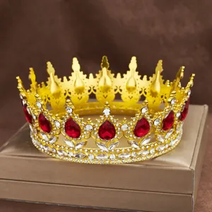 Detail shot of a baroque alloy crown with red teardrop rhinestones and clear crystals.