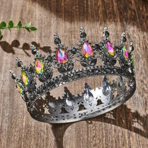 Baroque rhinestone crown detail shot, featuring colorful teardrop crystals on antique silver.
