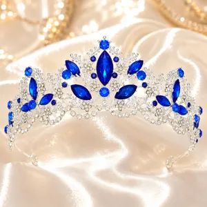 Detailed view of the sparkling blue crystal baroque tiara wedding crown hair accessory.