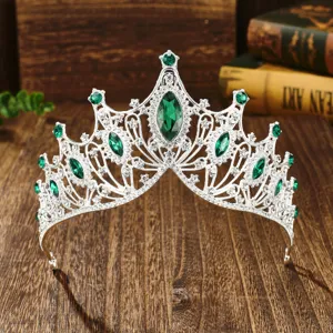 Baroque silver bridal tiara crown with green crystal and sparkling rhinestones for wedding party.