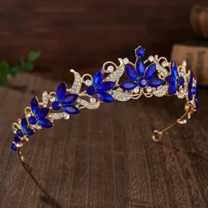 Detailed shot of a gorgeous blue rhinestone bridal tiara, sparkling crystal crown jewelry.