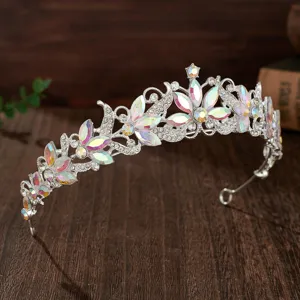 Elegant silver bridal tiara hair accessory with sparkling crystal rhinestones for wedding.