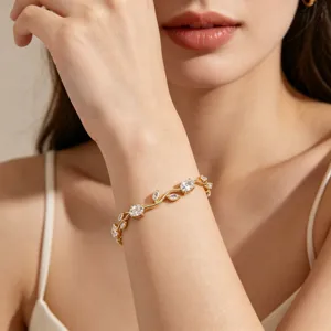 Elegant gold-plated leaf vine bracelet featuring sparkling clear zircon stones for daily wear.