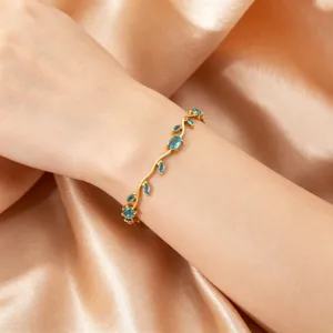 Exquisite gold-plated branch bracelet featuring sparkling blue zircon stones for elegant daily wear.