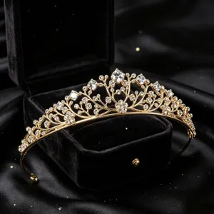 Exquisite gold crystal tiara hair accessory detail, luxury crown for party and special events.