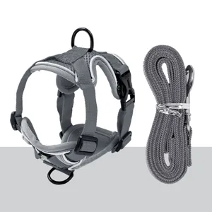 Grey breathable mesh pet cat harness and leash set, anti-breakaway outdoor walking strap.