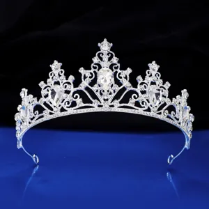 Exquisite silver bridal tiara with sparkling crystal rhinestones, perfect for wedding.
