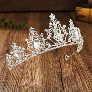 Close-up detail shot of sparkling silver rhinestone bridal tiara crystal crown accessory.