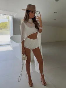 Elegant long sheer white chiffon shawl worn by a model in a minimalist room setting