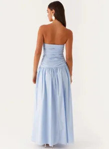 Detailed view of the light blue strapless ruched maxi dress, elegant evening gown back view.
