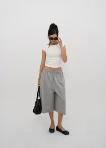 Detailed view of grey wide-leg drawstring cropped pants for women in a vintage casual style