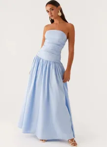 Detailed view of the light blue strapless ruched maxi dress worn by model in studio.