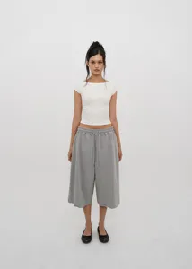 Full shot of women's grey loose drawstring cropped pants with a comfortable elastic waist