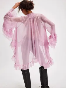Sheer oversized purple ruffle blouse with lantern sleeves and a bow tie neck.