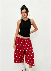 Macro view of red polka dot retro wide-leg pants for a stylish summer casual look