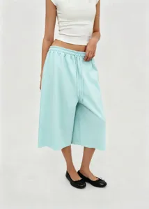 Stylish mint green wide-leg culottes featuring a drawstring elastic waist for women's summer wear
