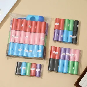 Colorful pet waste bags with dispenser rolls set for dog poop cleaning daily use.