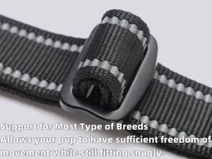Close-up detail of durable nylon dog harness buckle with reflective stitching