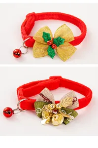 Detailed view of two Christmas pet collars with red velvet, festive bows, and bells.