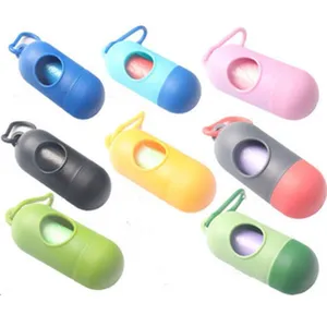 Portable capsule dog poop bag dispenser pet waste holder with trash bags for pets.