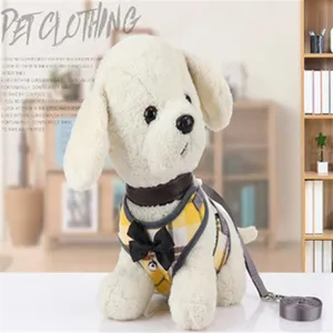 Yellow plaid pet harness and leash set shown on a white plush toy dog model detail view