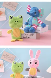 Close-up of colorful animal plush squeaky toys for pets in a soft studio setting